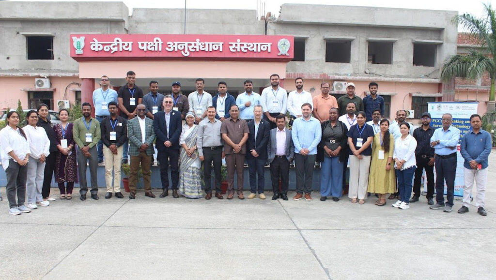 Group photo of attendees outside building at ICAR–CARI, Izatnagar for the International Workshop on PGCs Biobanking and Surrogate Technology for Conservation and Development of Chicken Genetic Resources