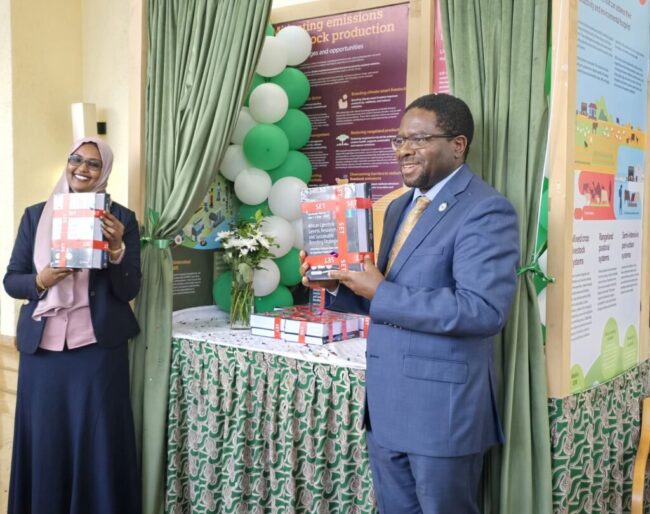 Dr. Huyam Salih, Director of AU-IBAR and Professor Appolinaire Djikeng, Director General, International Livestock Research Institute (ILRI), during launch of the African Livestock Genetic Resources and Sustainable Breeding Strategies book at ILRI in Nairobi. Photo Credit: ILRI